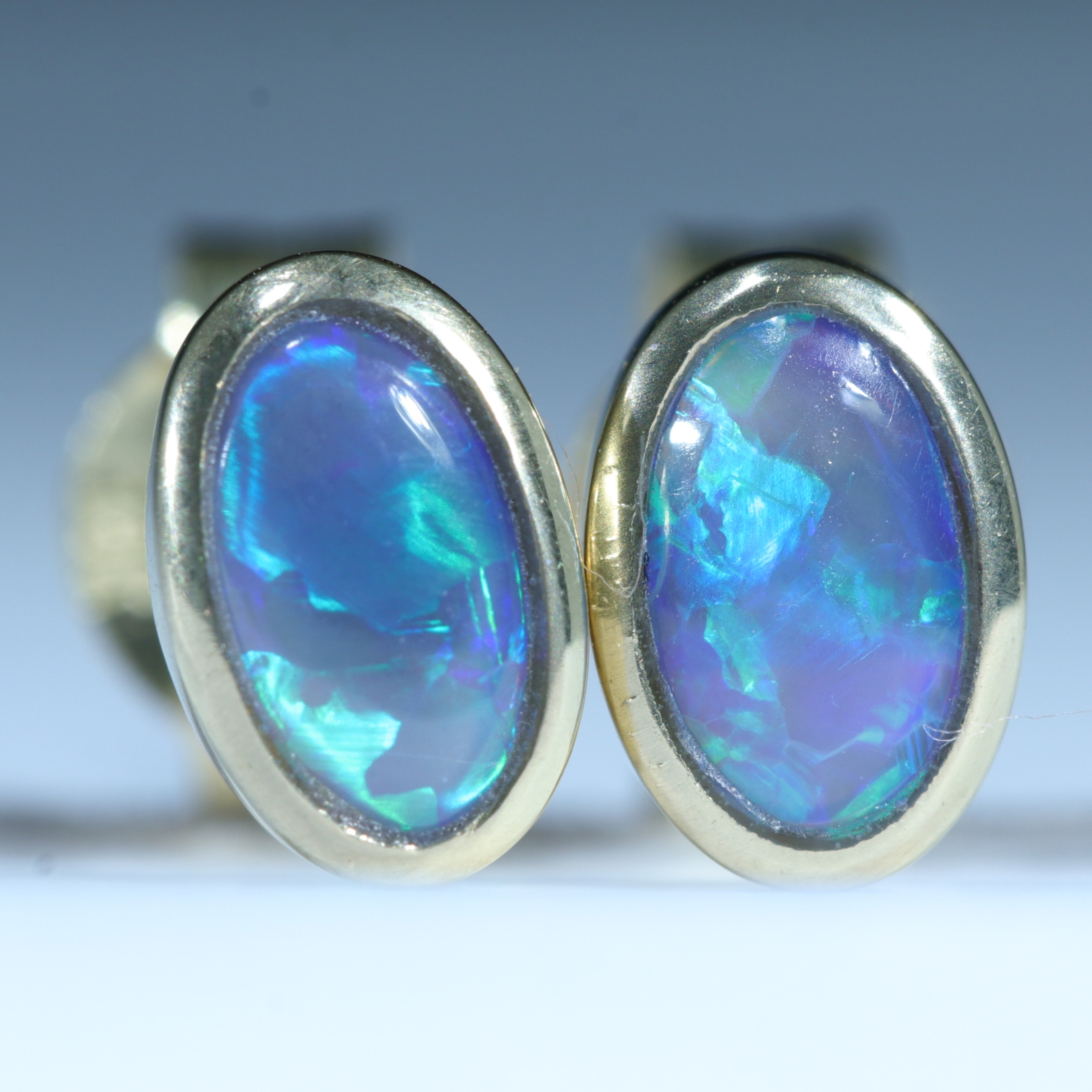 Natural Solid Australian Black Opal 18K Gold Earring Studs (6 x 4mm) Code EE81