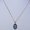 Natural Australian Boulder Opal and Diamond Gold Pendant .