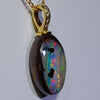 Natural Australian Boulder Opal and Diamond Gold Pendant .