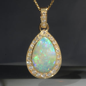 Natural opal ice 18k gold pendant