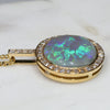 opal and diamond gold pendant side view