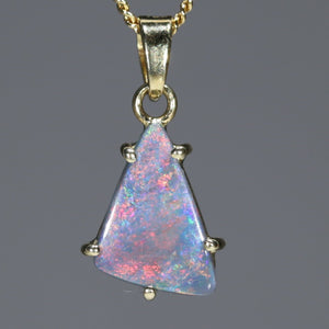 Semi Black Opal 18k pendant with flashes of red and pink