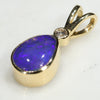18k Gold and Diamond Blue Opal pendant