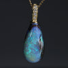 Natural opal day and night 10 gold pendant