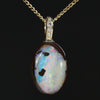 Natural opal happy 10k gold pendant