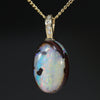 Natural Australian Boulder Opal and Diamond Gold Pendant .