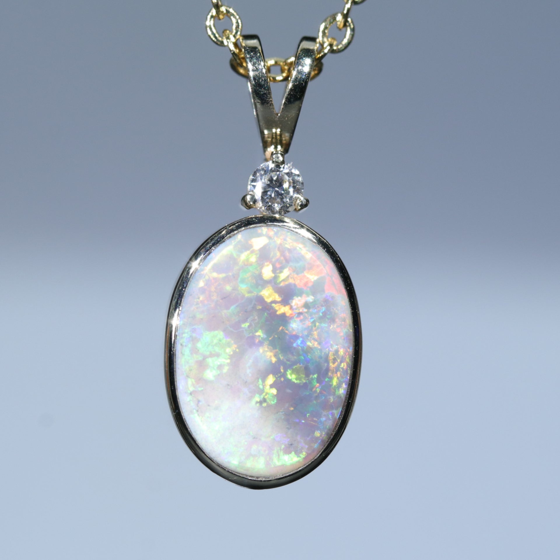 Lightning Ridge Dark Opal and Diamond Gold Pendant (11mm x 8mm) Code - AA33