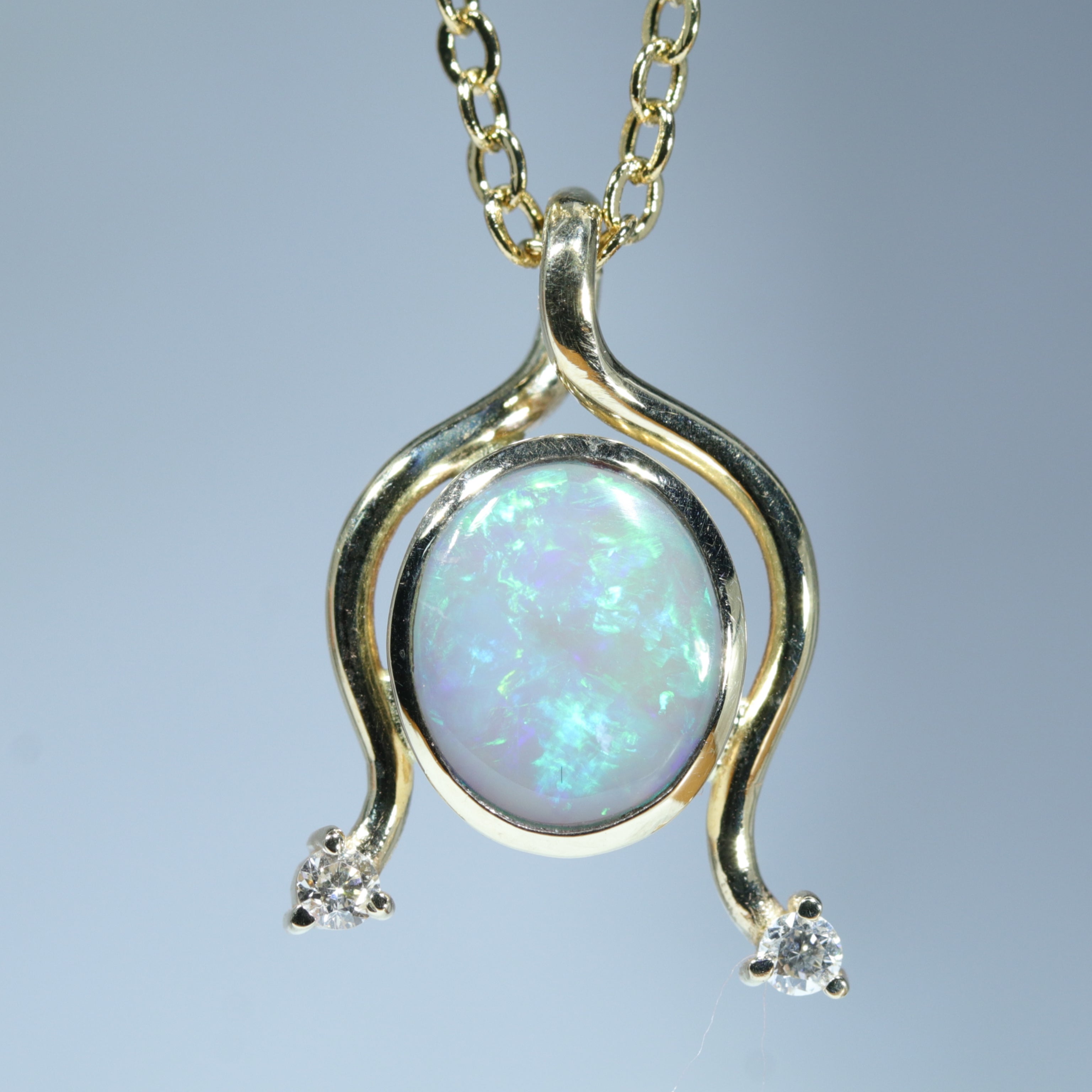 Coober Pedy Dark Opal and Diamond Gold Pendant (9mm x 7.5mm) Code - AA43